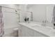 Bright bathroom with double sink vanity, and shower-tub combo at 106 Capanne Ct, Clayton, NC 27527