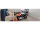 Bedroom featuring a desk, chair, and a basketball-themed comforter at 106 Capanne Ct, Clayton, NC 27527