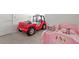 Playful ' bedroom featuring a Jeep bed and a pink princess bed at 106 Capanne Ct, Clayton, NC 27527