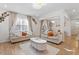 Stylish living room featuring modern decor and comfortable seating at 106 Capanne Ct, Clayton, NC 27527