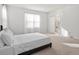 Bright main bedroom with a sliding door to a luxurious main bathroom at 106 Capanne Ct, Clayton, NC 27527