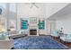 A spacious living room with a fireplace and built-in bookshelves at 108 Finnway Ln, Cary, NC 27519