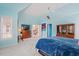 A spacious main bedroom with blue colored walls and high ceilings at 108 Finnway Ln, Cary, NC 27519