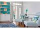 Cozy sitting area with built in shelves and French doors at 108 Finnway Ln, Cary, NC 27519