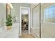 Bathroom featuring a glass shower and a double vanity at 1109 Frenchurch Way, Apex, NC 27502