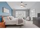 Serene bedroom with bay window, comfortable seating, and closet at 11228 N Radner Way, Raleigh, NC 27613