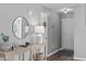Charming entryway with a console table, decorative mirror, and stylish decor at 11228 N Radner Way, Raleigh, NC 27613