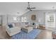 Spacious living area with hardwood floors and an oversized sectional sofa at 11228 N Radner Way, Raleigh, NC 27613