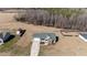 Aerial view of a charming single-Gathering home with a well-manicured lawn at 121 Starlight Dr, Lillington, NC 27546