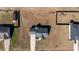 An aerial view reveals a well-maintained house with a large yard, complemented by a long driveway at 121 Starlight Dr, Lillington, NC 27546