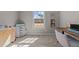 Neutral-toned bedroom with window view, crafting station, and work space at 121 Starlight Dr, Lillington, NC 27546
