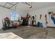 The garage of the home features neutral walls and flooring at 121 Starlight Dr, Lillington, NC 27546