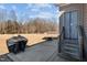 Back patio area with steps leading to the yard at 121 Starlight Dr, Lillington, NC 27546