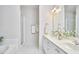 Bright bathroom with double sink vanity, shower, and tub at 200 S Dawson St # 303, Raleigh, NC 27601
