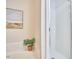 Bright bathroom featuring a soaking tub and glass shower at 200 S Dawson St # 303, Raleigh, NC 27601