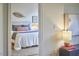 Inviting bedroom featuring a comfortable bed with stylish pillows and a cozy atmosphere at 200 S Dawson St # 303, Raleigh, NC 27601