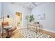 Bright bedroom featuring an office space with a desk and chair at 200 S Dawson St # 303, Raleigh, NC 27601