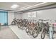 Organized bike storage area with a variety of bicycles neatly arranged and secured at 200 S Dawson St # 303, Raleigh, NC 27601