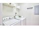 Bright laundry room with a white washer and dryer at 200 S Dawson St # 303, Raleigh, NC 27601
