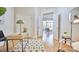 Bright office space with hardwood floors, stylish rug and modern desk with access to a bright, sun-filled room at 200 S Dawson St # 303, Raleigh, NC 27601