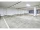 Bright and spacious parking garage with clearly marked spaces and multiple entry doors for easy access at 200 S Dawson St # 303, Raleigh, NC 27601