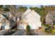 Charming home featuring a two-car garage and a combination of stone and vinyl siding at 209 Intern Way, Durham, NC 27713