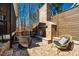 Picturesque outdoor brick fireplace with seating area perfect for relaxing outdoors at 2109 Meadowcreek Dr, Durham, NC 27705