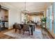 Elegant dining room with hardwood floors and easy access to the kitchen and living areas at 2109 Meadowcreek Dr, Durham, NC 27705