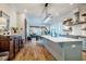 Elegant open-concept kitchen with large island, modern appliances, and seamless flow to living areas at 2109 Meadowcreek Dr, Durham, NC 27705