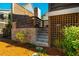Stairway next to foundation, connecting outdoor spaces, with professional landscape design at 2109 Meadowcreek Dr, Durham, NC 27705