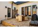 Outdoor patio features brickwork, built-in grill and dining table, great for cookouts at 2109 Meadowcreek Dr, Durham, NC 27705