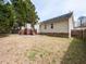 Expansive backyard featuring a wooden deck and lush lawn, perfect for outdoor entertaining and relaxation at 212 Walnut Creek Dr, Clayton, NC 27520