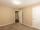 Comfortable bedroom features neutral carpet, fresh paint, and easy access to other rooms at 212 Walnut Creek Dr, Clayton, NC 27520