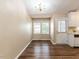 Bright dining area featuring a chandelier and windows for natural light at 212 Walnut Creek Dr, Clayton, NC 27520