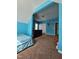 Bright bedroom featuring a bed, large closet, and attached living area at 2132 Royal Berry Ct, Cary, NC 27511