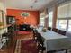 Dining area with table, chairs, barstool seating, and large windows at 2132 Royal Berry Ct, Cary, NC 27511