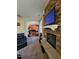 View of living room showcasing stone fireplace feature and open floor plan at 2132 Royal Berry Ct, Cary, NC 27511