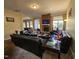 Spacious living room boasts a stone fireplace, natural light, and ample seating for entertaining at 2132 Royal Berry Ct, Cary, NC 27511