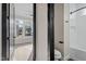 Bathroom next to the bedroom featuring a shower and tub combination at 226 Woodsborough Pl, Raleigh, NC 27601