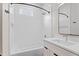 Bathroom featuring a tub and shower combination with white tiles and a light vanity at 226 Woodsborough Pl, Raleigh, NC 27601
