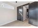 An empty bedroom provides a spacious feel with hardwood floors and closet at 226 Woodsborough Pl, Raleigh, NC 27601