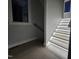 Staircase with underneath lighting leading to the next floor at 226 Woodsborough Pl, Raleigh, NC 27601