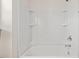 Bathroom featuring a white shower and bathtub with chrome fixtures at 23 Juliette Dr, Durham, NC 27713
