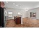 Open kitchen flows into the dining area, with access to a patio and natural light at 23 Juliette Dr, Durham, NC 27713