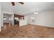 Inviting living area featuring tile floors, an open layout, and seamless connection to the kitchen at 23 Juliette Dr, Durham, NC 27713