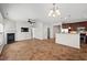 Spacious living room with fireplace, ceiling fan, and an open layout perfect for entertaining guests at 23 Juliette Dr, Durham, NC 27713