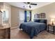 Bedroom with a door that leads outside; blue comforter on the bed, and neutral colored walls at 2425 Shreve Rd, Rocky Mount, NC 27801