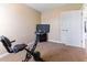 Bedroom featuring a workout bike and entertainment center at 2425 Shreve Rd, Rocky Mount, NC 27801