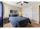 Neutral bedroom with a ceiling fan and a comfortable looking blue blanket on the bed at 2425 Shreve Rd, Rocky Mount, NC 27801