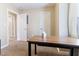 Versatile room with neutral walls, carpet, and wooden desk at 2425 Shreve Rd, Rocky Mount, NC 27801